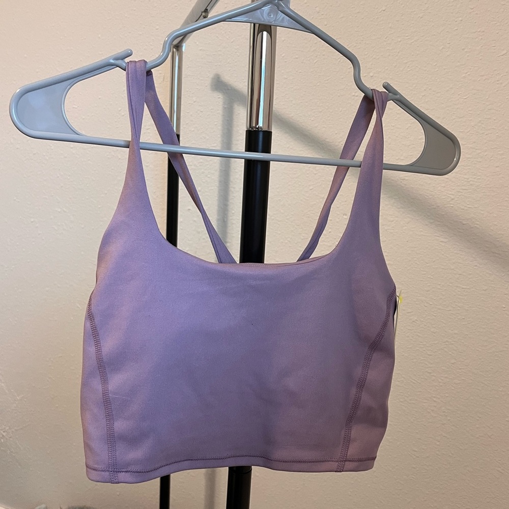 all in motion, lavender cropped workout top. new with tags, never been worn.
